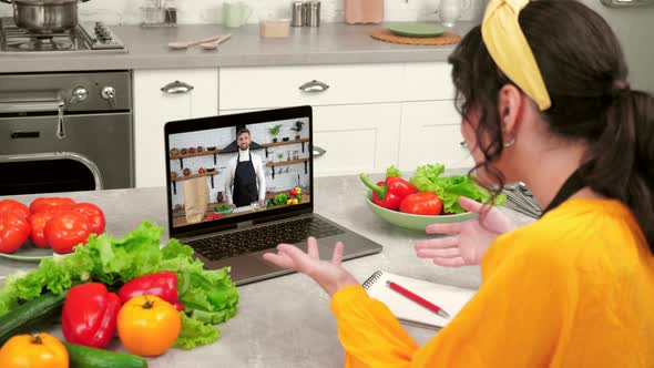 Emotional Positive Housewife in Home Kitchen Study Online Video Call Tells Chef
