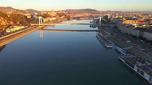 The Elisabeth Bridge is reflected in the River Danube in Budapest