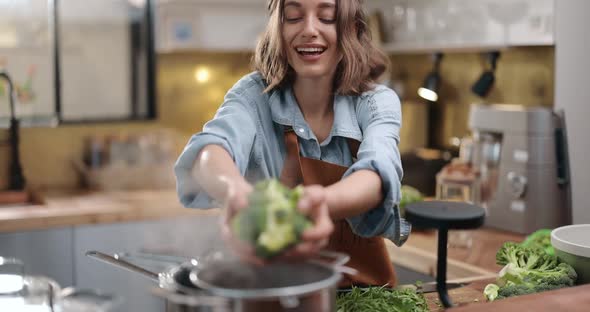 Woman Cooking Healthy Food at Home