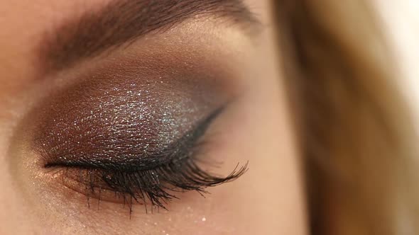 Eyelashes. Cosmetic Eyeshadow. Close Up, Slow Motion