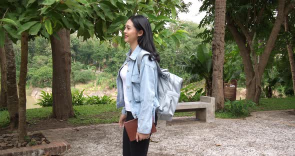 Asian Woman Student Walking To University