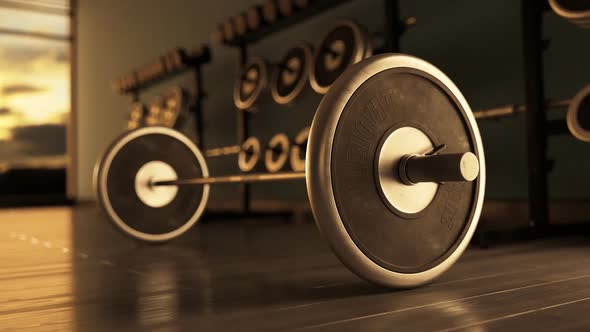 Barbell with Weight Plates On Modern Gym Floor.  Bodybuilding, strength concept