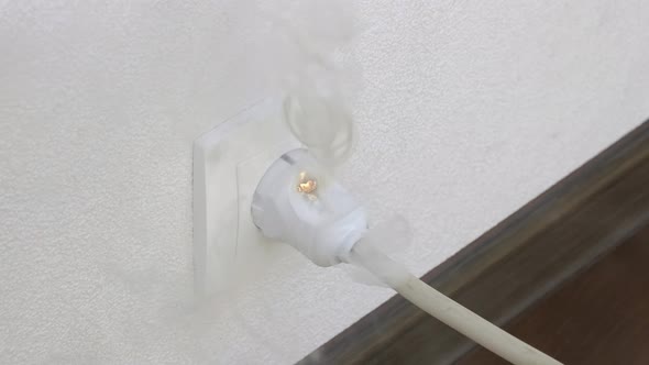 Ignition of Outlet During Short Circuit in Apartment