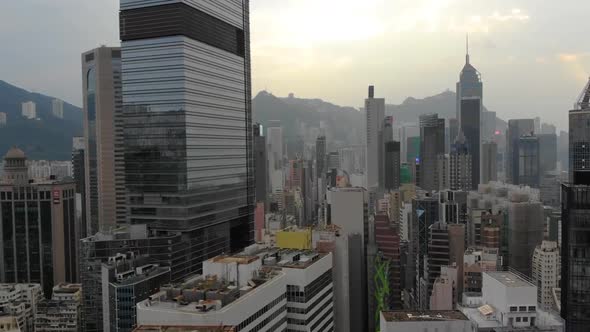 Hong Kong at dusk, upward going drone