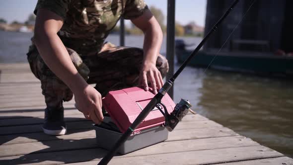 fisherman with a rod and fishing tackle, a man with fishing skills