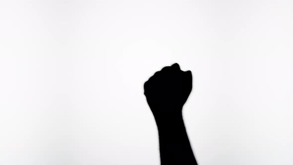 Man Showing Fist Protest Gesture with Fingers Isolated on White Background