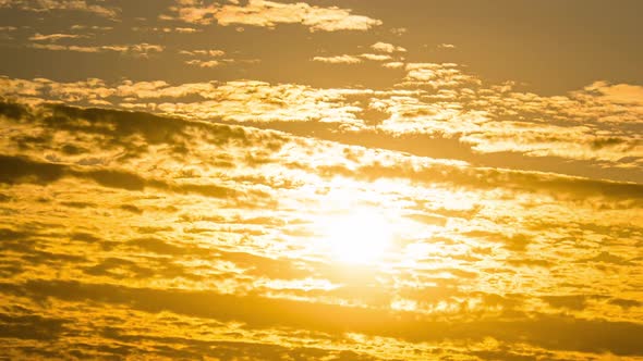 Amazing Dramatic Sunset Behind the Cumulus Cirrus Clouds. Time Lapse.