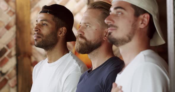 Soccer Fans Sing the National Anthem Before the Game in Sports Bar