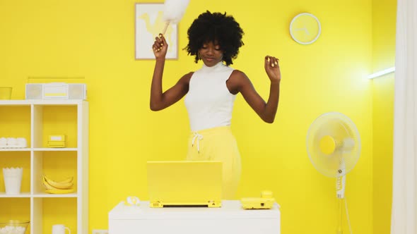 Black Lady Is Dancing With Dust Cleaner