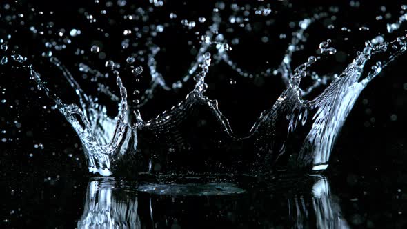 Super Slow Motion Shot of Water Crown Splash at 1000Fps Isolated on Black Background