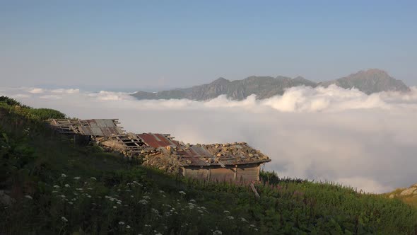 Chalet With Stone Walls Above the Clouds on High Plateau