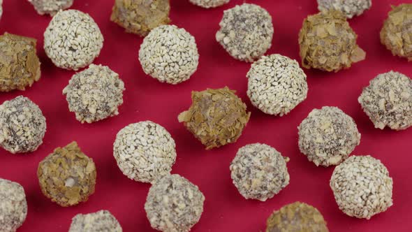 Delicious Handmade Chocolates Decorated Nut Chips Peanut Crumbs and Sesame