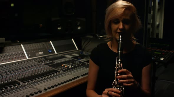 Woman playing a clarinet