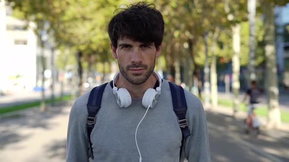 Man with backpack in the city