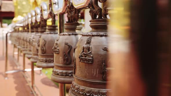 Buddhist Prayer Bells at Temple in Thailand at Wat Phra Singh, Chiang Mai, Used for Praying and Budd