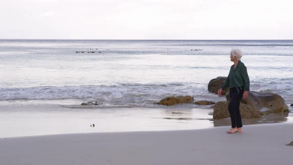 Woman walking on the beach 