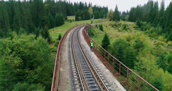 Aerial Shot Construction Worker on Railways alt