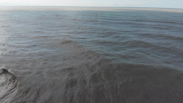 Drone flying over of big waves in Shekvetili sand beach