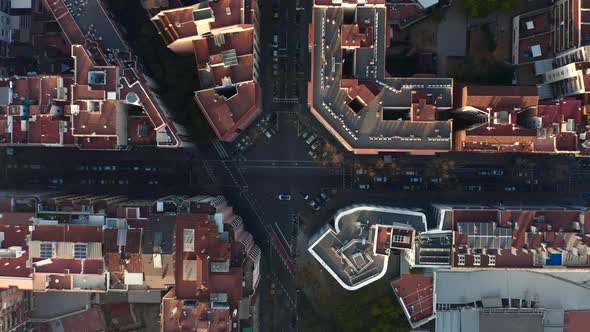 AERIAL: Overhead Drone Shot of Typical City Blocks Intersection in Barcelona, Spain in Beautiful