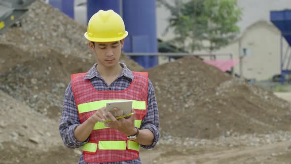 Construction Worker Using Tablet