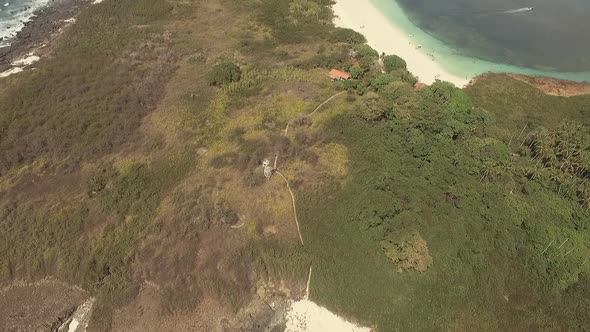 Aerial Tilt Reveal shot of Iguana Island, Republic of Panama