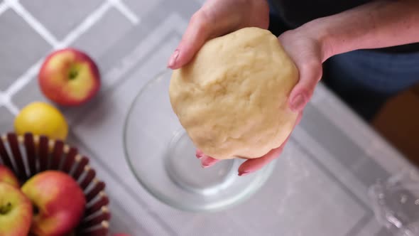 Apple Pie Preparation Series  Women's Hands Kneading Dough