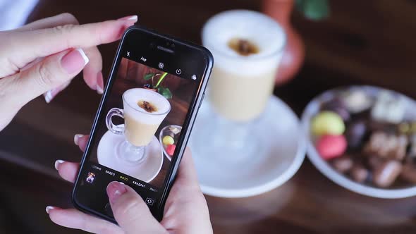 Food Photography. Woman Photographing Coffee On Phone Closeup