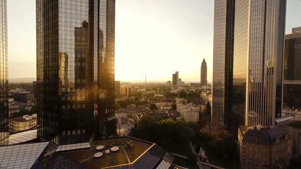 Aerial View of Modern City Business District at Sunset Sky