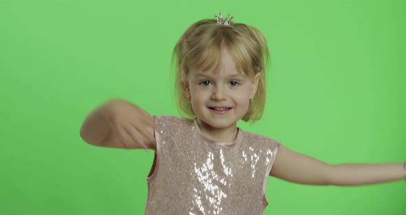 Girl in Glossy Dress Dancing. Happy Four Years Old Child. Chroma Key