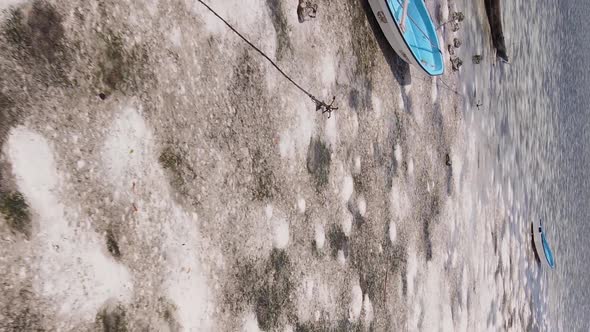 Vertical Video of Low Tide in the Ocean Near the Coast of Zanzibar Tanzania Aerial View