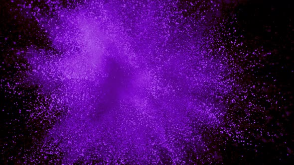 Purple powder exploding on black background in super slow motion, shot with Phantom Flex 4K alt