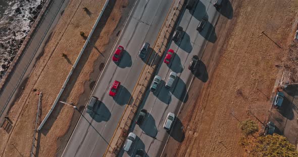 Freeway Cars and Trucks on Road Traffic on Highway