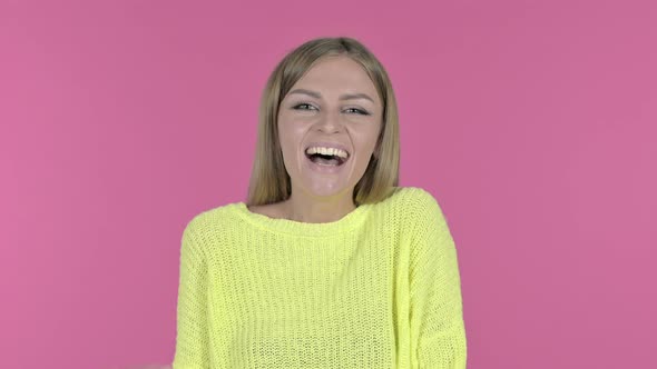 Cheerful Young Woman Laughing Pink Background