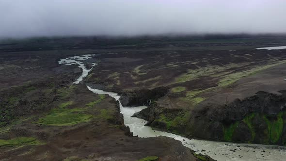 Iceland. View on river and waterfall in canyon from drone. Landscape in Iceland