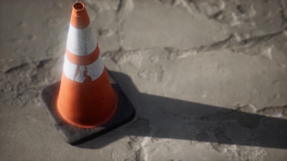 Orange and White Striped Traffic Cone