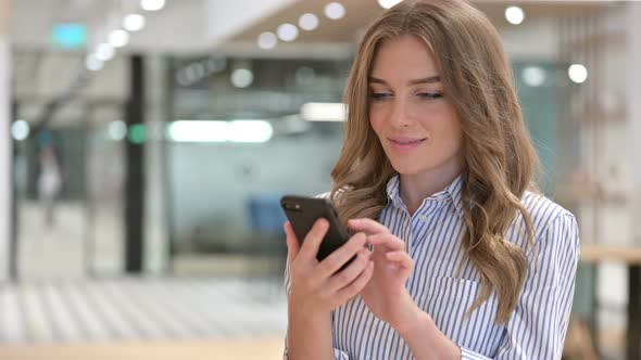 Portrait of Businesswoman Using Smartphone 