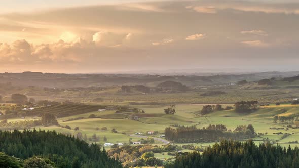 Sunrise over Green Rural Countryside in Summer Morning in New Zealand Nature