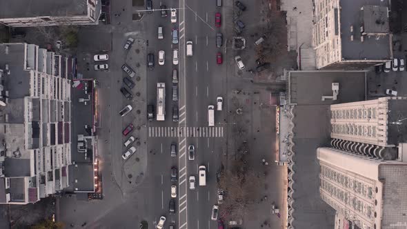 Late Evening Overhead Aerial Drone Flight Top Down View of Busy City Rush Hour Heavy Traffic