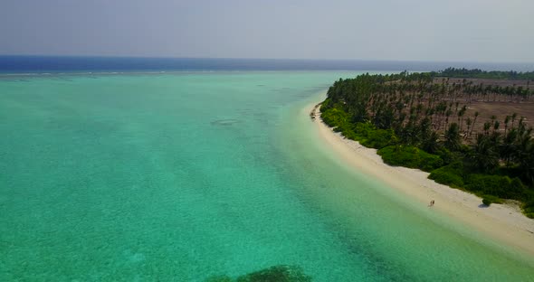 Natural above island view of a white sand paradise beach and blue water background in best quality 4