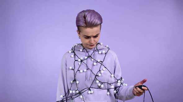 Young Woman Turning on Lightbulbs Changing Mood Positive Indoors