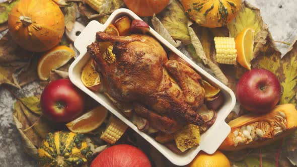 Festive Chicken Baked By Thanksgiving on White Owen Plate and a Harvest of Seasonal Vegetables