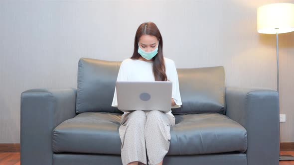 Young asian woman use laptop