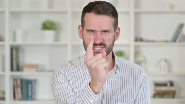 Portrait of Upset Young Man Feeling Angry