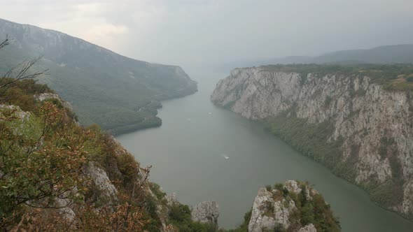 Tilting on Serbia and Romania state border 4K 2160p 30fps UltraHD footage - Danube river gorge and m