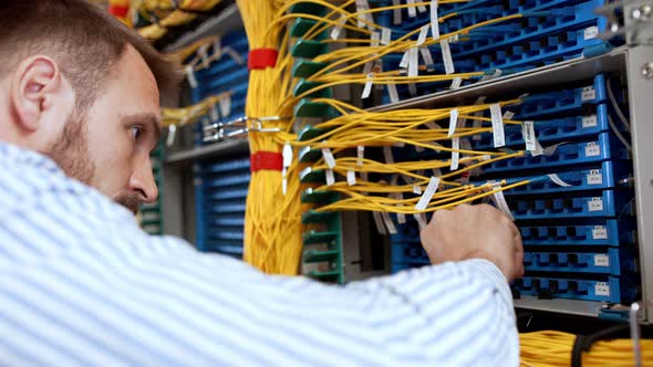 Engineer Working in Data Room