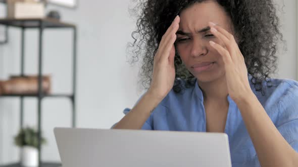 Tired African Woman Working on Laptop