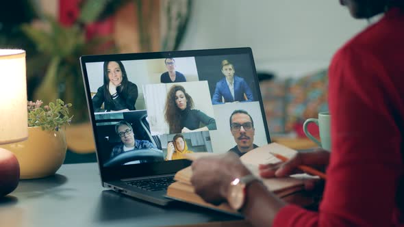 Multiuser Online Lesson Is Held By an African Woman at Home. Online Education Concept