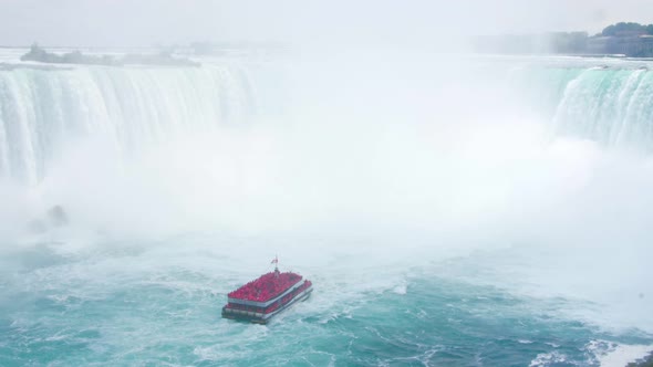 Niagara Falls Hornblower Tour Boat Under Horseshoe Waterfall Rainbow