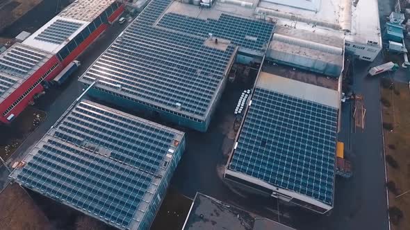 Sunny batteries on the roofs of industrial buildings