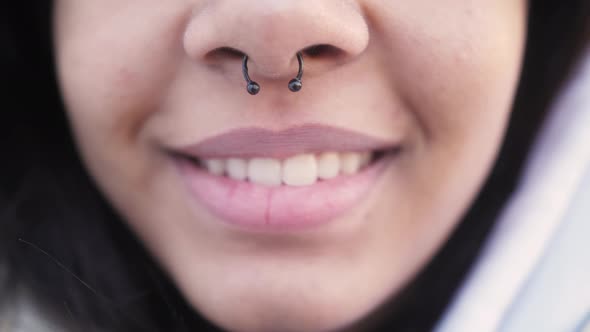 Close Up of Black Girl Wearing Nose Septum Ring